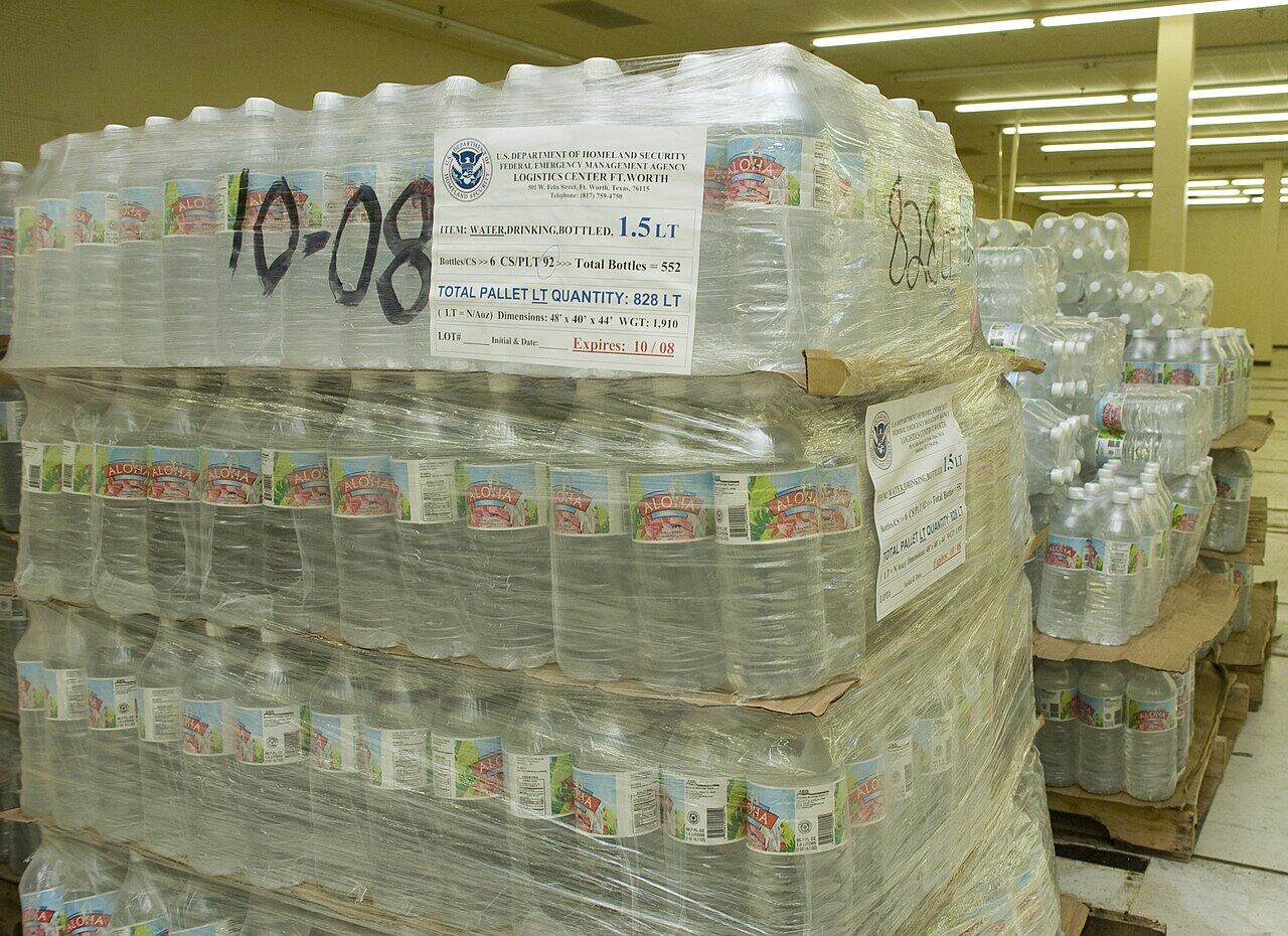 Pallets of bottled water staged for disaster relief